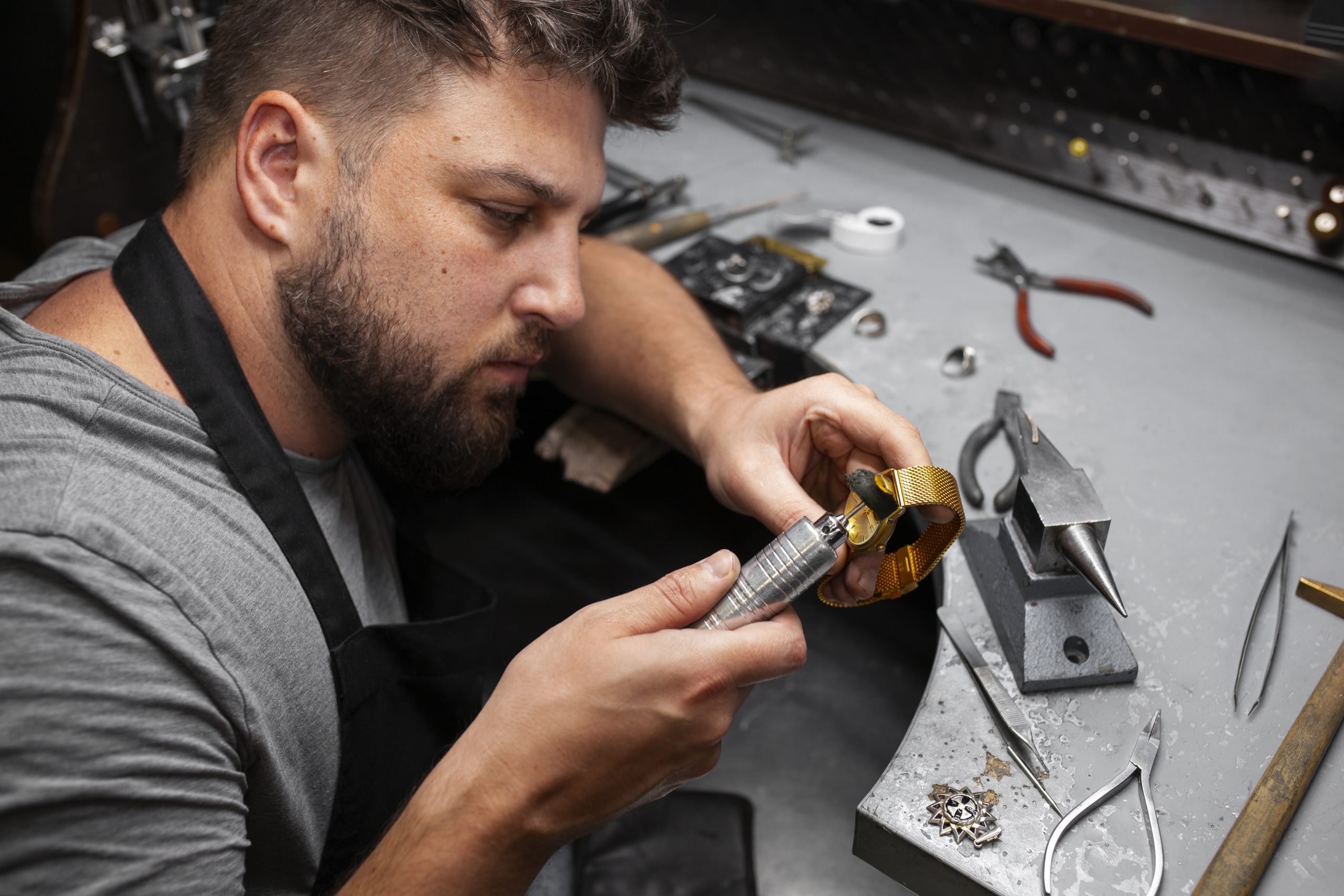 medium-shot-jeweler-making-jewellery
